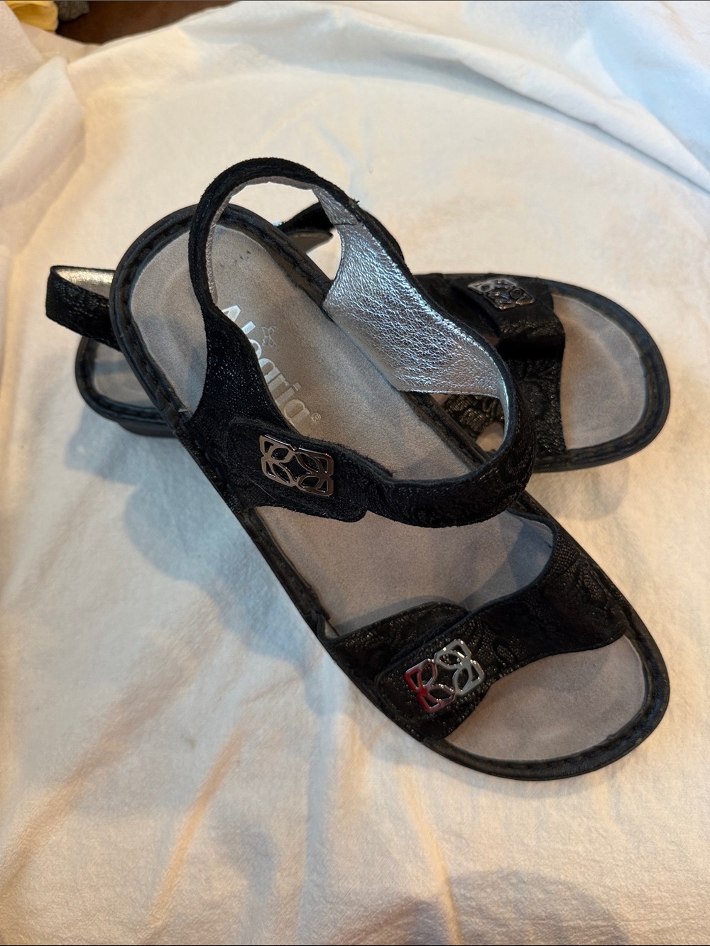 Alegria Black Slingback Sandals with Decorative Metal Accents